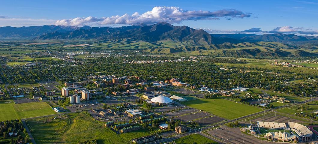 Aerial view of the MSU campus and Bozeman with the Bridger Range behind